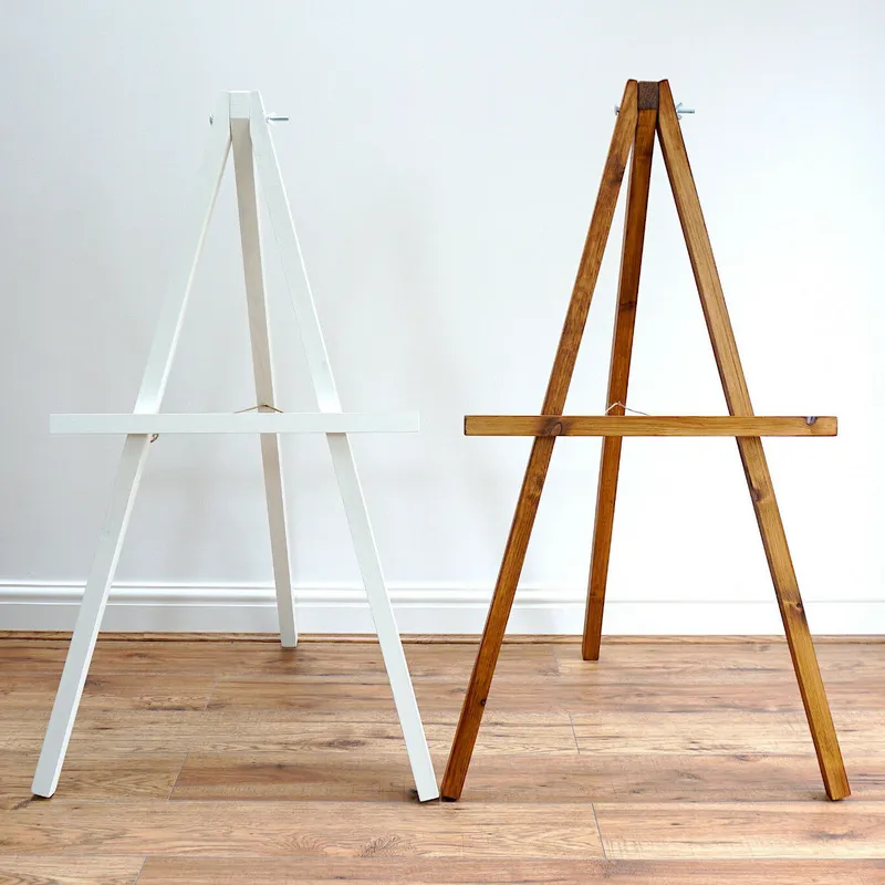 Wedding Easel standing on a wooden floor against a plain white wall